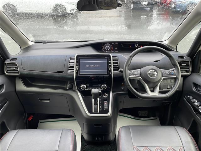 セレナ ライダー プロパイロットエディション 純正9インチメモリナビ 純正フリップダウンモニター プロパイロット エマージェンシーブレーキ フルセグ Bluetooth バックカメラ 両側パワースライドドア 革調シートカバー ブレーキホールド(3枚目)