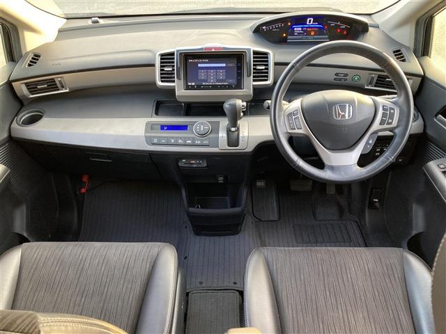 フリードハイブリッド ジャストセレクション ☆純正ナビ(フルセグ/CD)☆両側パワースライドドア☆クルーズコントロール☆HIDヘッドライト☆オートライト☆ハーフレザーシート☆ウォークスルー☆純正15インチAW☆純正フロアマット(2枚目)