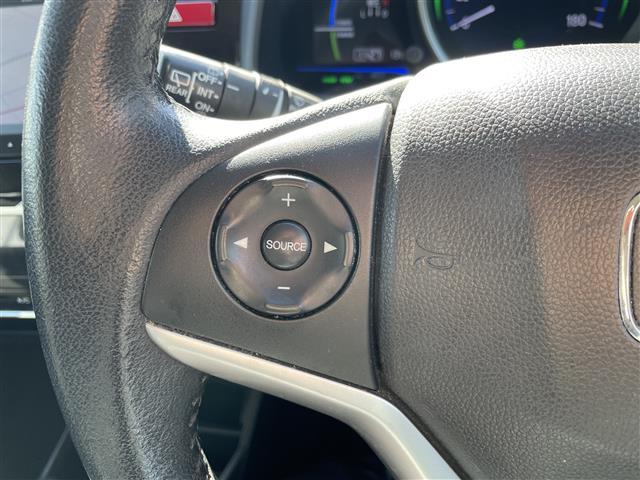 フィットハイブリッド Lパッケージ ビルトインETC バックカメラ SDナビ BT ワンセグTV オートライト 衝突被害軽減ブレーキ 横滑り防止 ハーフレザーシート スマートキー アイドリングストップ(8枚目)