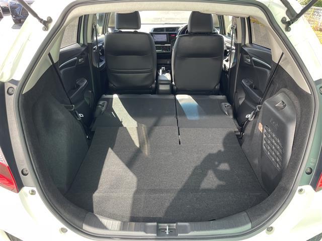 フィットハイブリッド Lパッケージ ビルトインETC バックカメラ SDナビ BT ワンセグTV オートライト 衝突被害軽減ブレーキ 横滑り防止 ハーフレザーシート スマートキー アイドリングストップ(34枚目)