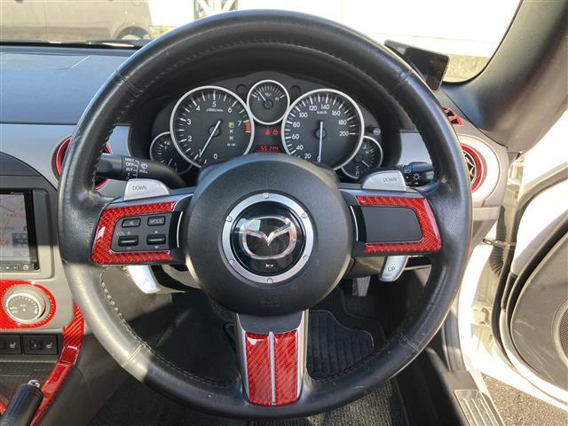 ロードスター ２０周年記念車　特別仕様車　社外メモリーナビ　フルセグＴＶ　ＥＴＣ　ＲＥＣＡＲＯ社製バケットハーフレザーシート　シートヒーター　革巻きステアリング　ステアリングスイッチ　ＨＩＤヘッドランプ　スマートキー２本（27枚目）