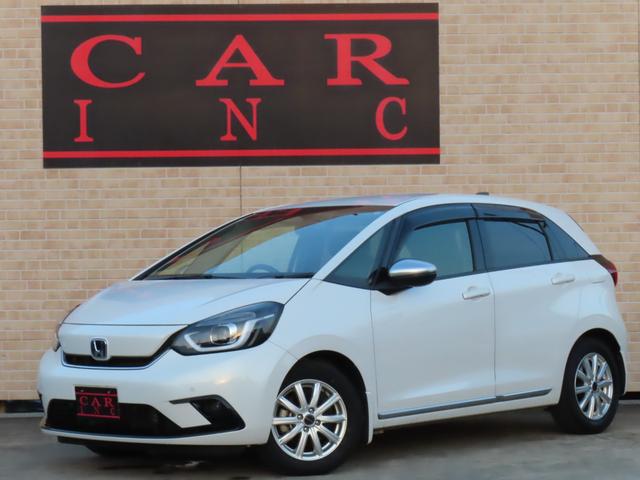 フィット ｅ：ＨＥＶリュクス　純正８インチナビ　フルセグＴＶ　バックカメラ　レーダークルーズコントロール　クリアランスソナー　衝突被害軽減ブレーキ　車線逸脱警報　ハーフレザーシート　ＬＥＤヘッドライト　社外アルミ（21枚目）