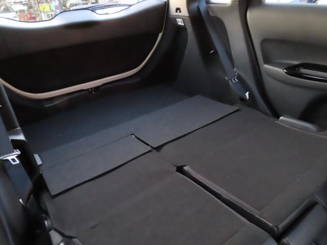 フィット ｅ：ＨＥＶリュクス　純正８インチナビ　フルセグＴＶ　バックカメラ　レーダークルーズコントロール　クリアランスソナー　衝突被害軽減ブレーキ　車線逸脱警報　ハーフレザーシート　ＬＥＤヘッドライト　社外アルミ（56枚目）