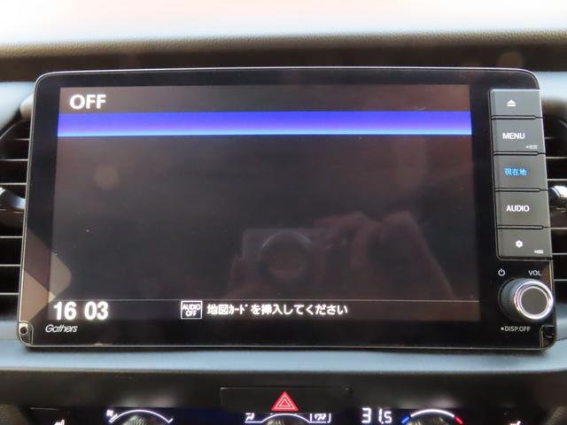 フィット ｅ：ＨＥＶリュクス　純正８インチナビ　フルセグＴＶ　バックカメラ　レーダークルーズコントロール　クリアランスソナー　衝突被害軽減ブレーキ　車線逸脱警報　ハーフレザーシート　ＬＥＤヘッドライト　社外アルミ（58枚目）