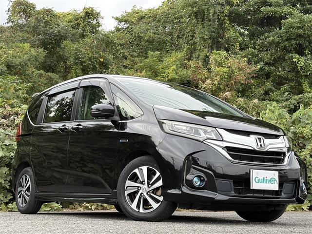 フリードハイブリッド ハイブリッド・EX レーダーC 地デジフルセグTV 車線逸脱警報装置 シ-トヒ-タ- AUX リヤカメラ LEDライト フルオートエアコン ABS DVD再生可 ウォークスルー サイドエアバッグ キーフリー ナビ&TV(10枚目)