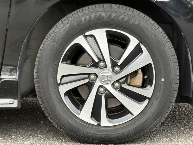 フリードハイブリッド ハイブリッド・EX レーダーC 地デジフルセグTV 車線逸脱警報装置 シ-トヒ-タ- AUX リヤカメラ LEDライト フルオートエアコン ABS DVD再生可 ウォークスルー サイドエアバッグ キーフリー ナビ&TV(12枚目)