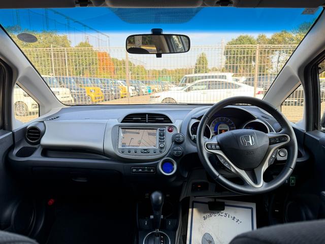 フィットハイブリッド ナビプレミアムセレクション　ワンオーナー・純ナビＴＶ・インターナビ・Ｒカメラ・ＥＴＣ・スマートキー・ＨＩＤ・クルコン・ＡＷ・シートヒーター　エアコン　運転席エアバッグ　ＤＶＤ再生　キーフリー　ワンセグ　パワーウィンドウ　Ｂカメラ（33枚目）