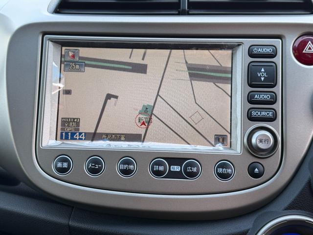 フィットハイブリッド ナビプレミアムセレクション　ワンオーナー・純ナビＴＶ・インターナビ・Ｒカメラ・ＥＴＣ・スマートキー・ＨＩＤ・クルコン・ＡＷ・シートヒーター　エアコン　運転席エアバッグ　ＤＶＤ再生　キーフリー　ワンセグ　パワーウィンドウ　Ｂカメラ（34枚目）