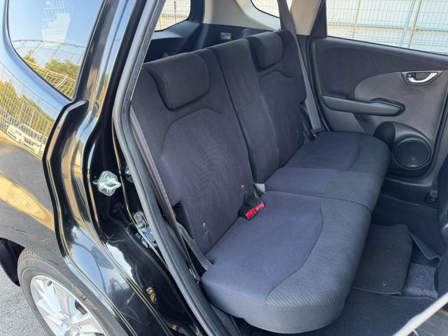 フィットハイブリッド ナビプレミアムセレクション　ワンオーナー・純ナビＴＶ・インターナビ・Ｒカメラ・ＥＴＣ・スマートキー・ＨＩＤ・クルコン・ＡＷ・シートヒーター　エアコン　運転席エアバッグ　ＤＶＤ再生　キーフリー　ワンセグ　パワーウィンドウ　Ｂカメラ（54枚目）