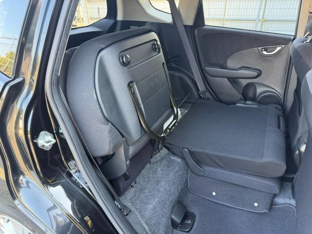 フィットハイブリッド ナビプレミアムセレクション　ワンオーナー・純ナビＴＶ・インターナビ・Ｒカメラ・ＥＴＣ・スマートキー・ＨＩＤ・クルコン・ＡＷ・シートヒーター　エアコン　運転席エアバッグ　ＤＶＤ再生　キーフリー　ワンセグ　パワーウィンドウ　Ｂカメラ（55枚目）