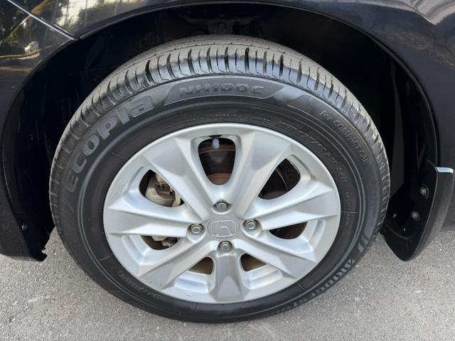 フィットハイブリッド ナビプレミアムセレクション　ワンオーナー・純ナビＴＶ・インターナビ・Ｒカメラ・ＥＴＣ・スマートキー・ＨＩＤ・クルコン・ＡＷ・シートヒーター　エアコン　運転席エアバッグ　ＤＶＤ再生　キーフリー　ワンセグ　パワーウィンドウ　Ｂカメラ（66枚目）