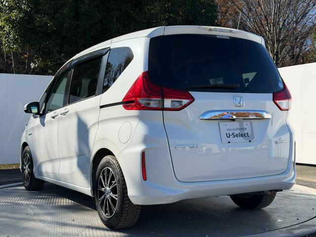 フリードハイブリッド ハイブリッド・Gホンダセンシング ワンオーナー・ドラレコ・9インチ・純ナビTV・Bluetooth・インターナビ・ルーフモニター・両パワスラ・スマートキー・LED 軽減ブレーキ キーフリーシステム 1オ-ナ- 記録簿 DVD再生可能(29枚目)