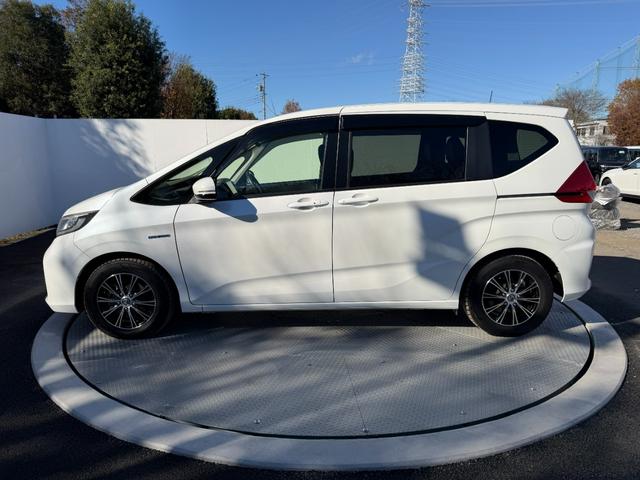 フリードハイブリッド ハイブリッド・Gホンダセンシング ワンオーナー・ドラレコ・9インチ・純ナビTV・Bluetooth・インターナビ・ルーフモニター・両パワスラ・スマートキー・LED 軽減ブレーキ キーフリーシステム 1オ-ナ- 記録簿 DVD再生可能(30枚目)