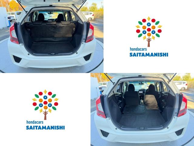 フィット 13G・Fパッケージ ワンオーナー・7インチ純ナビTV・スマートキー・ETC ワンオーナー車 DVD再生可能 スマ-トキ- 記録簿有り VSA ETC付き 助手席エアバッグ オートエアコン エアバック PS キ-フリ-(6枚目)