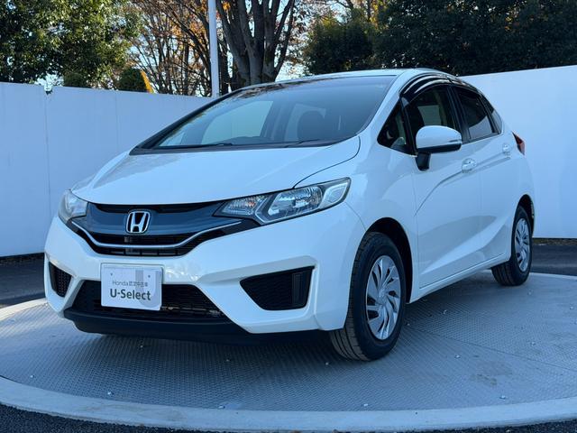 フィット 13G・Fパッケージ ワンオーナー・7インチ純ナビTV・スマートキー・ETC ワンオーナー車 DVD再生可能 スマ-トキ- 記録簿有り VSA ETC付き 助手席エアバッグ オートエアコン エアバック PS キ-フリ-(19枚目)