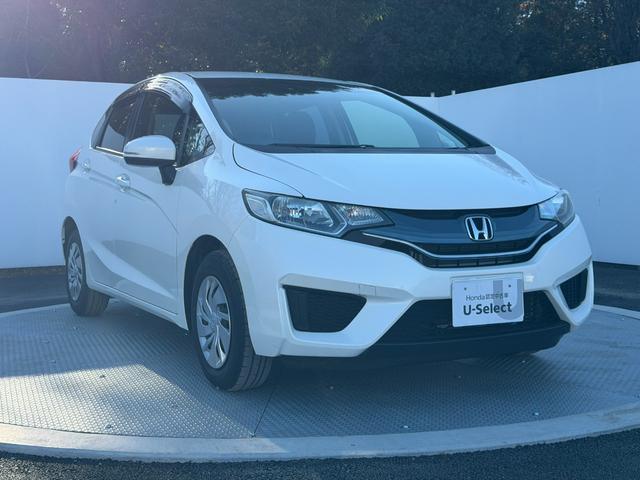 フィット 13G・Fパッケージ ワンオーナー・7インチ純ナビTV・スマートキー・ETC ワンオーナー車 DVD再生可能 スマ-トキ- 記録簿有り VSA ETC付き 助手席エアバッグ オートエアコン エアバック PS キ-フリ-(21枚目)