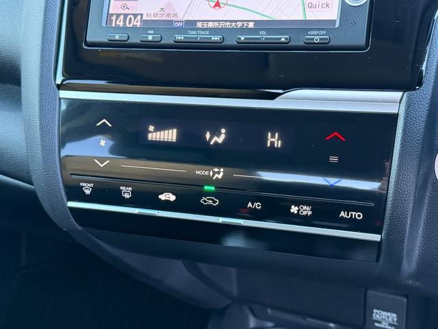 フィット 13G・Fパッケージ ワンオーナー・7インチ純ナビTV・スマートキー・ETC ワンオーナー車 DVD再生可能 スマ-トキ- 記録簿有り VSA ETC付き 助手席エアバッグ オートエアコン エアバック PS キ-フリ-(35枚目)