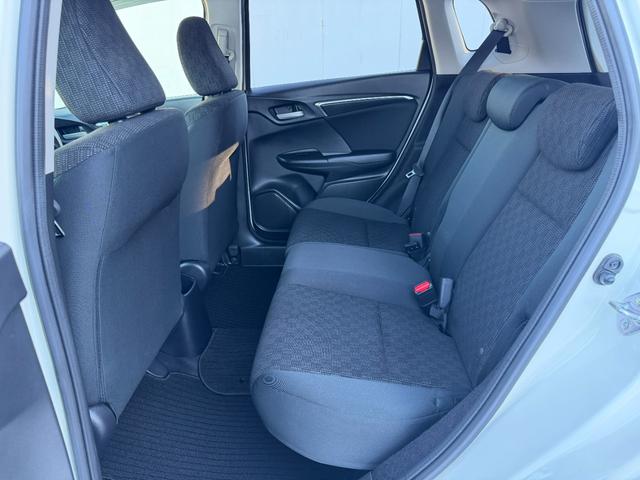 フィット 13G・Fパッケージ ワンオーナー・7インチ純ナビTV・スマートキー・ETC ワンオーナー車 DVD再生可能 スマ-トキ- 記録簿有り VSA ETC付き 助手席エアバッグ オートエアコン エアバック PS キ-フリ-(47枚目)