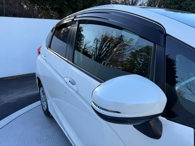 フィット 13G・Fパッケージ ワンオーナー・7インチ純ナビTV・スマートキー・ETC ワンオーナー車 DVD再生可能 スマ-トキ- 記録簿有り VSA ETC付き 助手席エアバッグ オートエアコン エアバック PS キ-フリ-(57枚目)