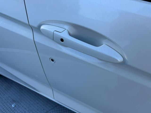 フィット 13G・Fパッケージ ワンオーナー・7インチ純ナビTV・スマートキー・ETC ワンオーナー車 DVD再生可能 スマ-トキ- 記録簿有り VSA ETC付き 助手席エアバッグ オートエアコン エアバック PS キ-フリ-(59枚目)