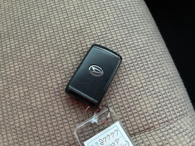 ミラココア ココアＸ　社外ナビ　Ｂｌｕｅｔｏｏｔｈ　ワンセグＴＶ　ＣＤ　ＤＶＤ再生可　ＥＴＣ　アイドリングストップ　ベンチシート　スマートキー（33枚目）