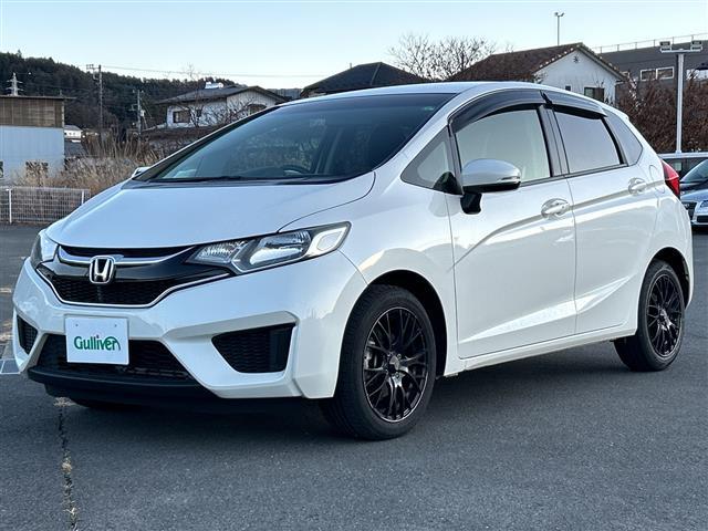 フィット １３Ｇ・Ｆパッケージ　純正ＳＤナビ　バックカメラ　社外１６インチアルミホイール　社外フロアマット　ハロゲンライト　フルオートエアコン　アイドリングストップ　横滑り防止装置　スマートキー　ＥＴＣ（30枚目）