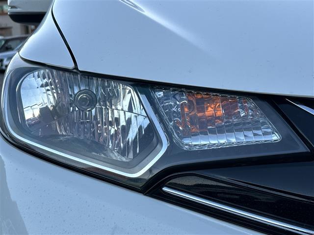 フィット １３Ｇ・Ｆパッケージ　純正ＳＤナビ　バックカメラ　社外１６インチアルミホイール　社外フロアマット　ハロゲンライト　フルオートエアコン　アイドリングストップ　横滑り防止装置　スマートキー　ＥＴＣ（34枚目）