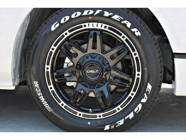 ハイエースワゴン ＧＬ　フロントスポイラー　オーバーフェンダー　ローダウン　Ｄｅｌｆ０４ＡＷ　ＧＯＯＤＹＥＡＲナスカータイヤ　パイオニア製フルセグナビ　ビルドインＥＴＣ　後席モニター　全席シートカバー　専用ベットキット（16枚目）