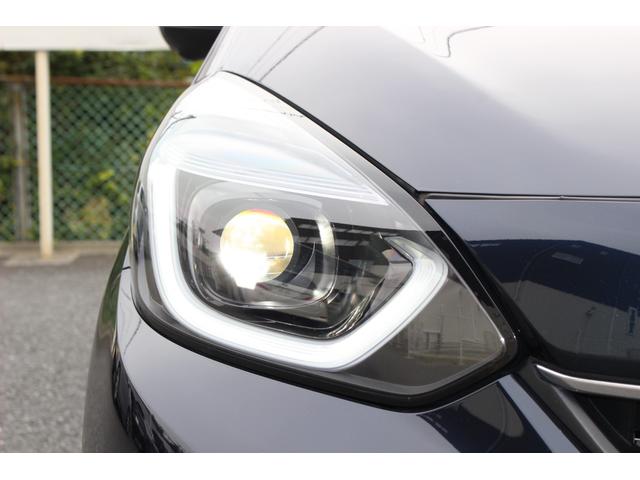 フィット e:HEVリュクス 当社元レンタカー 禁煙車 ETC2.0 ドラレコ シートヒーター サイドカーテンエアバッグ マルチビューカメラシステム スマートキーシステム BTオーディオ 誤発進抑制機能 本革シート フロントカメラ(8枚目)