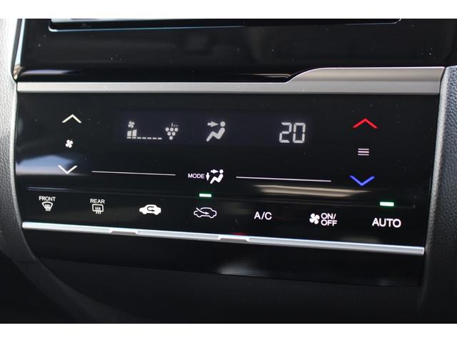 フィット １３Ｇ・Ｆパッケージファインエディション　純正ナビ　ワンオーナー　あんしんパッケージ　Ｂｌｕｅｔｏｏｔｈ　プラズマクラスター　サイドカーテンエアバッグ　オートリトラミラー　セキュリティアラーム　ＩＲカットガラス　アームレスト　インテリキー（11枚目）