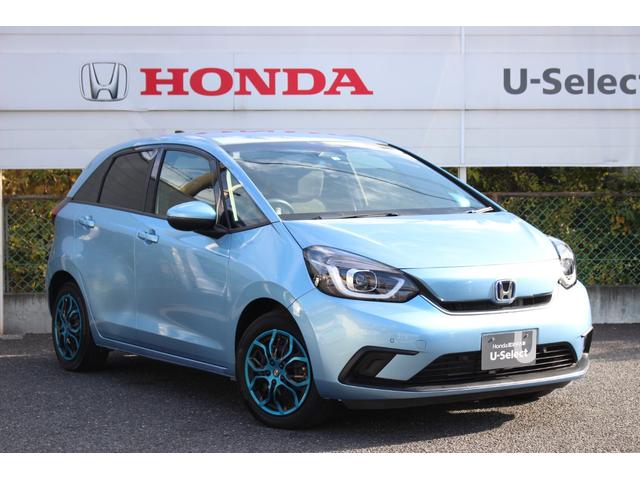 フィット ｅ：ＨＥＶホーム　純正ナビ　ワンオーナー　Ｂｌｕｅｔｏｏｔｈ　サイドカーテンエアバッグ　ＬＥＤヘッドライト　ＨｏｎｄａＳＥＮＳＩＮＧ　セキュリティアラーム　ＥＴＣ　前後誤発進抑制機能　クリソナ　助手席エアバッグ　ＡＣＣ（5枚目）