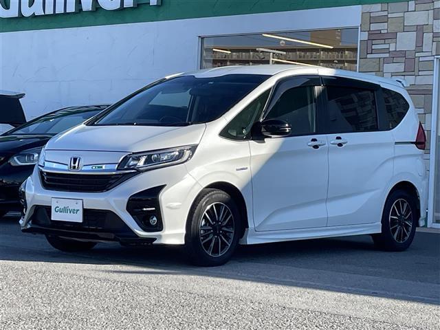 フリードハイブリッド ハイブリッド・モデューロＸ　ホンダセンシング　純正９インチナビ／バックカメラ／無限ドアプロテクター／両側パワースライドドア／追従式クルコン／ＬＥＤヘッドライト／ＬＥＤフォグライト／オートライト／ＥＴＣ／純正１５ＡＷ／ドアバイザー／電動格納ミラー（17枚目）