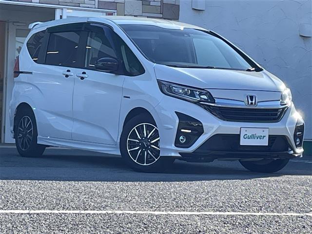 フリードハイブリッド ハイブリッド・モデューロＸ　ホンダセンシング　純正９インチナビ／バックカメラ／無限ドアプロテクター／両側パワースライドドア／追従式クルコン／ＬＥＤヘッドライト／ＬＥＤフォグライト／オートライト／ＥＴＣ／純正１５ＡＷ／ドアバイザー／電動格納ミラー（19枚目）