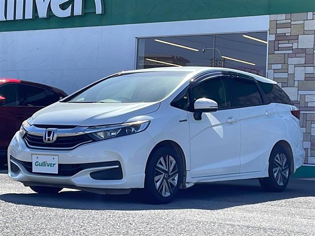 シャトル ハイブリッド　ホンダセンシング　禁煙車／純正ナビ／Ｂｌｕｅｔｏｏｔｈ／ＣＤ／ＳＤ／ＨＩＤヘッドライト／オートエアコン／社外フロアマット／ＥＴＣ／純正ホイールキャップ／パワステ／パワーウィンドウ／Ｗエアバッグ／横滑り防止／盗難防止（18枚目）