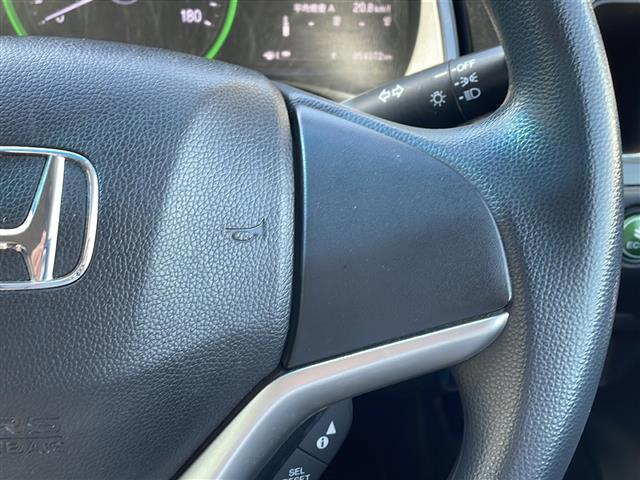 シャトル ハイブリッド　ホンダセンシング　禁煙車／純正ナビ／Ｂｌｕｅｔｏｏｔｈ／ＣＤ／ＳＤ／ＨＩＤヘッドライト／オートエアコン／社外フロアマット／ＥＴＣ／純正ホイールキャップ／パワステ／パワーウィンドウ／Ｗエアバッグ／横滑り防止／盗難防止（25枚目）