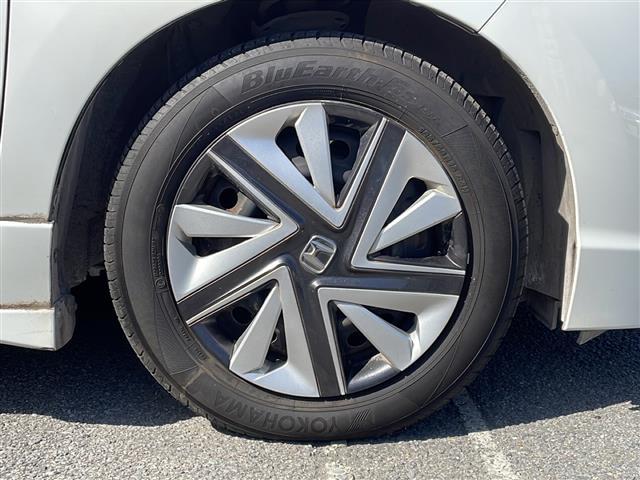 シャトル ハイブリッド　ホンダセンシング　禁煙車／純正ナビ／Ｂｌｕｅｔｏｏｔｈ／ＣＤ／ＳＤ／ＨＩＤヘッドライト／オートエアコン／社外フロアマット／ＥＴＣ／純正ホイールキャップ／パワステ／パワーウィンドウ／Ｗエアバッグ／横滑り防止／盗難防止（31枚目）