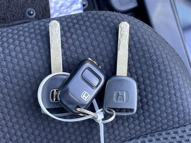 モビリオスパイク AタイプLパッケージ ターボ/純正オーディオ/MD/純正14インチアルミホイール/純正ドアバイザー/電動格納ミラー/フルフラットシート/フォグライト/ダブルエアバック/キセノンヘッドライト/両側スライドドア/スペアキー(34枚目)