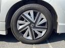ハイブリッド　ホンダセンシング　禁煙車／純正ナビ／Ｂｌｕｅｔｏｏｔｈ／ＣＤ／ＳＤ／ＨＩＤヘッドライト／オートエアコン／社外フロアマット／ＥＴＣ／純正ホイールキャップ／パワステ／パワーウィンドウ／Ｗエアバッグ／横滑り防止／盗難防止（31枚目）