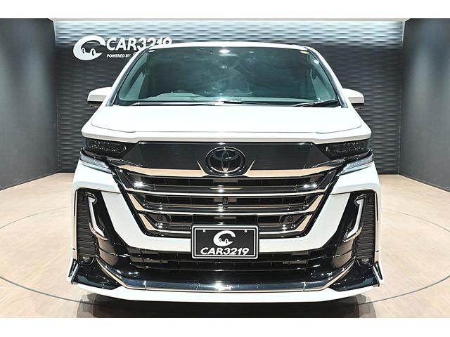 ヴェルファイアハイブリッド Ｚ　プレミア　黒革／モデリスタエアロ（Ｆ・Ｓ・Ｒ）／モデリスタマフラー／シグネチャーイルミブレード／イルミルーフスポイラー／サイドエンブレムイルミ／ピラーライト／ディスプレイオーディオ／リアモニター／ＥＴＣ／全方位（3枚目）