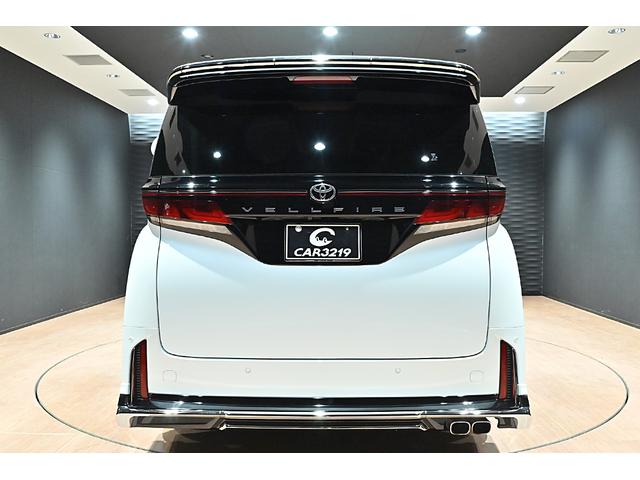 ヴェルファイアハイブリッド Ｚ　プレミア　黒革／モデリスタエアロ（Ｆ・Ｓ・Ｒ）／モデリスタマフラー／シグネチャーイルミブレード／イルミルーフスポイラー／サイドエンブレムイルミ／ピラーライト／ディスプレイオーディオ／リアモニター／ＥＴＣ／全方位（4枚目）