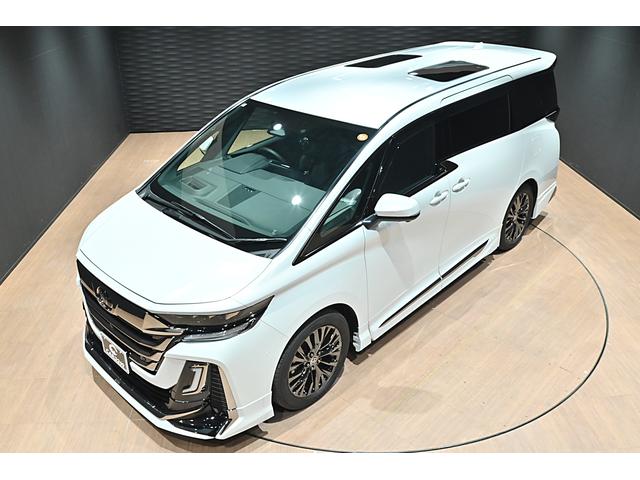 ヴェルファイアハイブリッド Ｚ　プレミア　黒革／モデリスタエアロ（Ｆ・Ｓ・Ｒ）／モデリスタマフラー／シグネチャーイルミブレード／イルミルーフスポイラー／サイドエンブレムイルミ／ピラーライト／ディスプレイオーディオ／リアモニター／ＥＴＣ／全方位（7枚目）