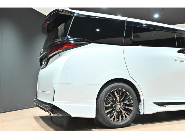 ヴェルファイアハイブリッド Ｚ　プレミア　黒革／モデリスタエアロ（Ｆ・Ｓ・Ｒ）／モデリスタマフラー／シグネチャーイルミブレード／イルミルーフスポイラー／サイドエンブレムイルミ／ピラーライト／ディスプレイオーディオ／リアモニター／ＥＴＣ／全方位（56枚目）