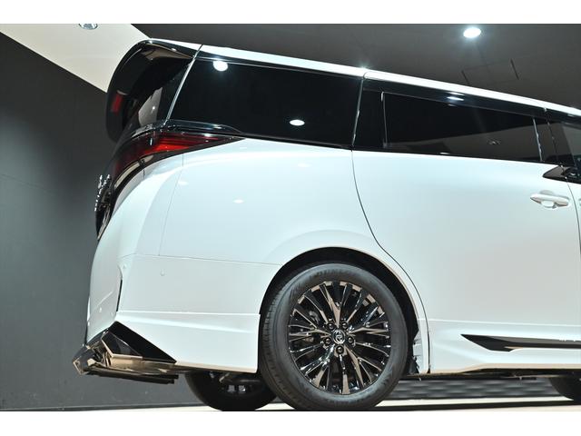 ヴェルファイアハイブリッド Ｚ　プレミア　黒革／モデリスタエアロ（Ｆ・Ｓ・Ｒ）／モデリスタマフラー／シグネチャーイルミブレード／イルミルーフスポイラー／サイドエンブレムイルミ／ピラーライト／ディスプレイオーディオ／リアモニター／ＥＴＣ／全方位（57枚目）