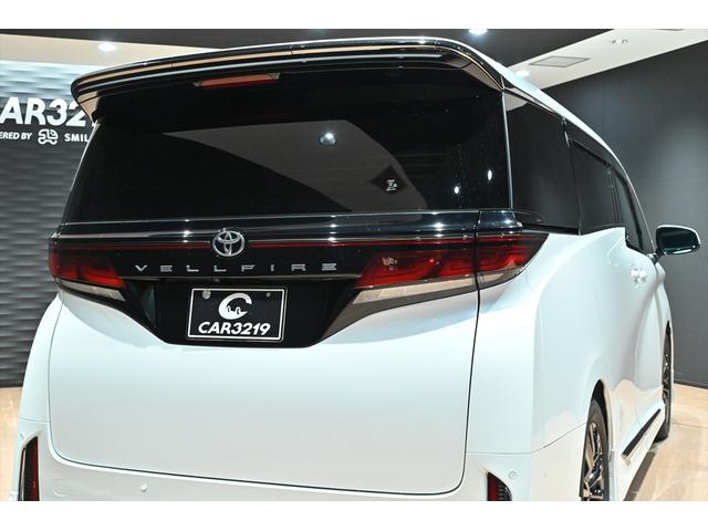 ヴェルファイアハイブリッド Ｚ　プレミア　黒革／モデリスタエアロ（Ｆ・Ｓ・Ｒ）／モデリスタマフラー／シグネチャーイルミブレード／イルミルーフスポイラー／サイドエンブレムイルミ／ピラーライト／ディスプレイオーディオ／リアモニター／ＥＴＣ／全方位（60枚目）