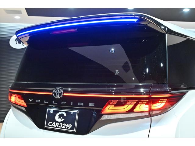 ヴェルファイアハイブリッド Ｚ　プレミア　黒革／モデリスタエアロ（Ｆ・Ｓ・Ｒ）／モデリスタマフラー／シグネチャーイルミブレード／イルミルーフスポイラー／サイドエンブレムイルミ／ピラーライト／ディスプレイオーディオ／リアモニター／ＥＴＣ／全方位（61枚目）