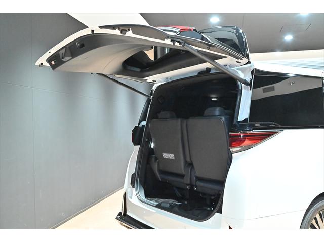 ヴェルファイアハイブリッド Ｚ　プレミア　黒革／モデリスタエアロ（Ｆ・Ｓ・Ｒ）／モデリスタマフラー／シグネチャーイルミブレード／イルミルーフスポイラー／サイドエンブレムイルミ／ピラーライト／ディスプレイオーディオ／リアモニター／ＥＴＣ／全方位（63枚目）