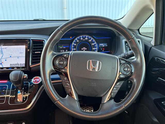 オデッセイハイブリッド ハイブリッド　全方位カメラ／純正ナビ／両側パワースライドドア／ブラインドスポットモニター／ハーフレザー／パワーシート／衝突軽減システム／ドライブレコーダー／クルーズコントロール／シートヒーター／オットマン／ＬＥＤ（2枚目）