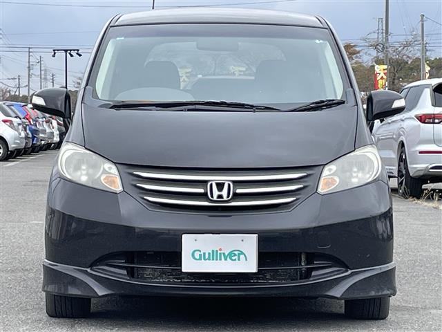 フリード フレックス エアロ ワンオーナー 純正ディーラーOPナビ バックカメラ 片側パワースライドドア ステアリングリモコン リモコンキー HIDヘッドライト 電動格納ミラー ウィンカーミラー 純正フロアマット 冬タイヤ積込(2枚目)