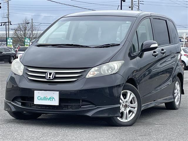 フリード フレックス エアロ ワンオーナー 純正ディーラーOPナビ バックカメラ 片側パワースライドドア ステアリングリモコン リモコンキー HIDヘッドライト 電動格納ミラー ウィンカーミラー 純正フロアマット 冬タイヤ積込(6枚目)