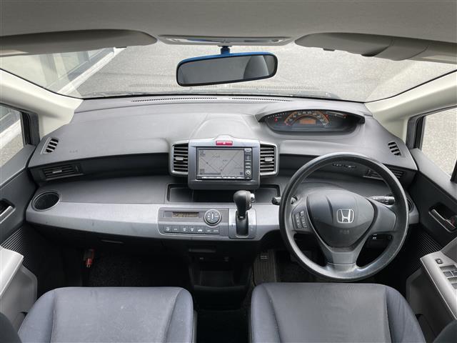 フリード フレックス エアロ ワンオーナー 純正ディーラーOPナビ バックカメラ 片側パワースライドドア ステアリングリモコン リモコンキー HIDヘッドライト 電動格納ミラー ウィンカーミラー 純正フロアマット 冬タイヤ積込(42枚目)